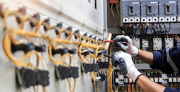 Professional Electrician technician working in The Hills, TX